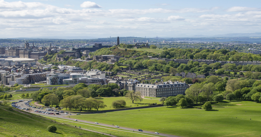 Edinburgh city and Holyrood Park viewed from above St Margaret's Loch