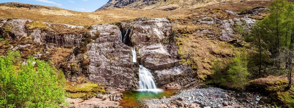 The Meeting of Three Waters en Glencoe, Escocia